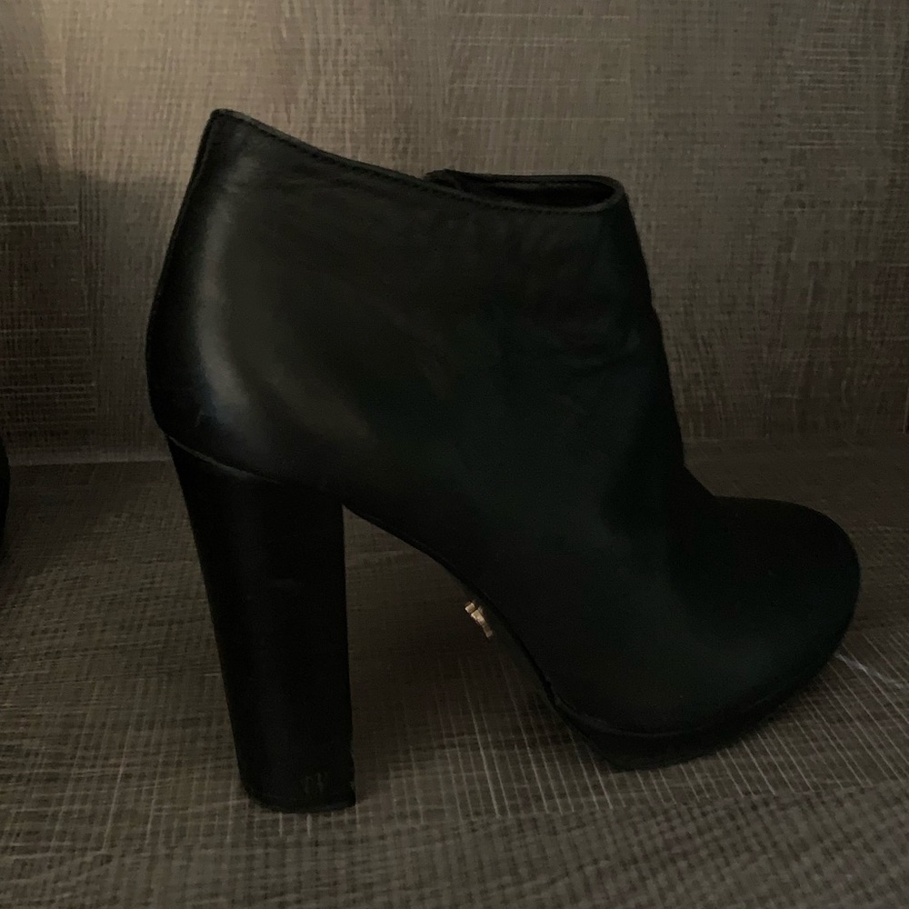 Black leather heeled ankle boots